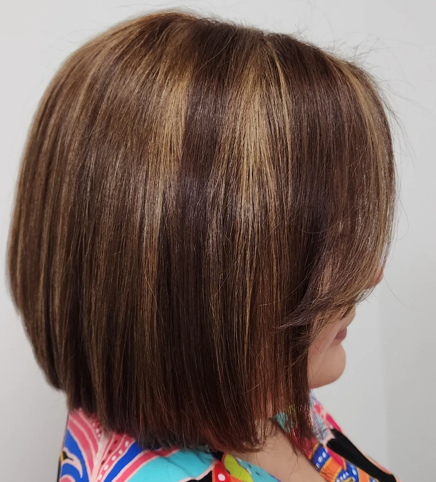 Glossy caramel bob, cut and colored in the studio